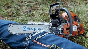 Helmet and protective clothing are safety essentials when using a chainsaw 