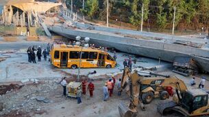 Flyover collapse kills two in World Cup city