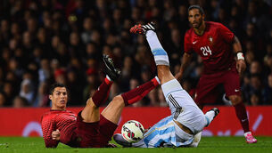 Portugal win but Messi outshines Ronaldo
