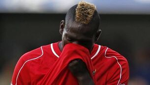 Balotelli accepts FA racist charge