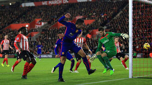 Van Persie double shoots United up to third