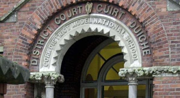 Two men remanded in custody over iron bar attack
