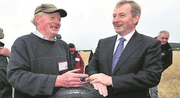Michael Lenihan, Carrigtwohill, Cork, with Taoiseach Enda Kenny at the senior tractor class yesterday Michael Lenihan, Carrigtwohill, Cork, with Taoiseach Enda Kenny at the senior tractor class yesterday