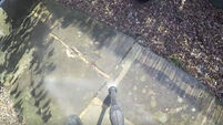 Man makes dramatic GoPro video of himself… washing his steps with a power hose