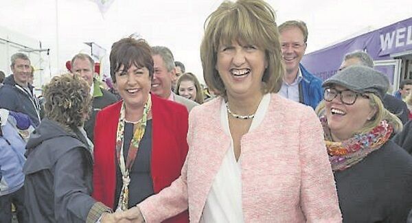 Joan Burton makes her way through the crowds at the second day of the National Ploughing Championships