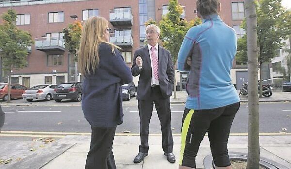 Kevin Humphreys Labour TD, Minister of State at the Department of Social Protection, speaks to residents