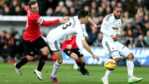 Swansea pile the pressure on Louis van Gaal