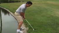 Watch this golfer get a chilly finish to his putting shot