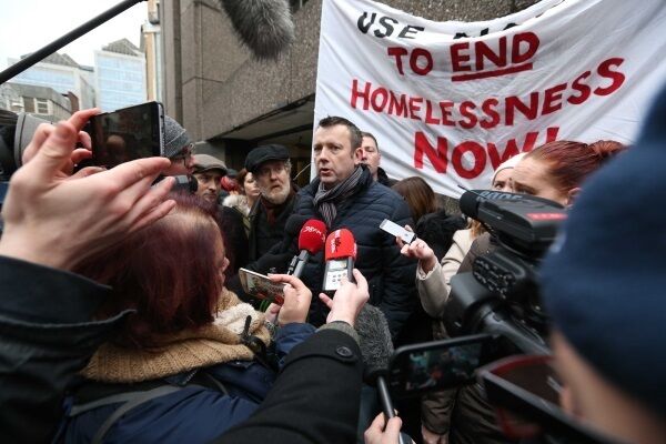 Musician Glen Hansard and activist Brendan Ogle speaking to the media outside Apollo House. Musician Glen Hansard and activist Brendan Ogle speaking to the media outside Apollo House.