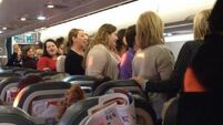 Choir gives passengers on Dublin-bound flight a Christmas surprise