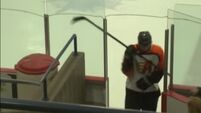VIDEO: Hockey fail as player clotheslines himself