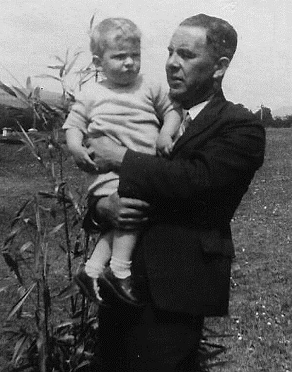 Seán in his father’s arms, aged 18 months, June 1937, in front of the family home near Ballylickey Seán in his father’s arms, aged 18 months, June 1937, in front of the family home near Ballylickey