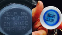 PR disaster for drinks company as &rsquo;help me&rsquo; messages found on bottle caps