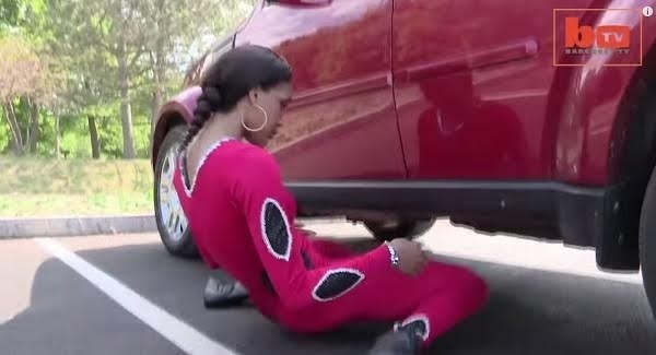 VIDEO: Record breaker limbos underneath car