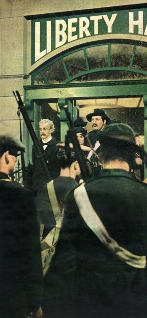 Volunteers parade in front of Tom Clarke and James Connolly in a scene from 1966 RTÉ drama Insurrection.