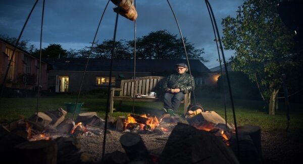 Argentine chef Francis Mallmann, an expert at cooking with fire, slow cooking a rib eye of beef at sunrise on Saturday morning at the Ballymaloe Cookery School gardens during the Kerrygold Ballymaloe Literary Festival of Food and Wine Litfest. Pic: Joleen Cronin