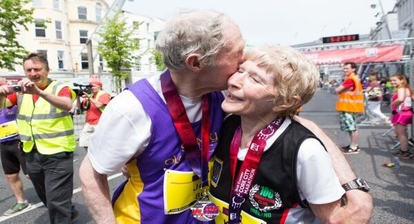 Kay and Joe celebrate finishing the marathon. Pic: Darragh Kane.