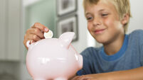 Quirky World: Half of parents admit raiding kids’ piggy banks