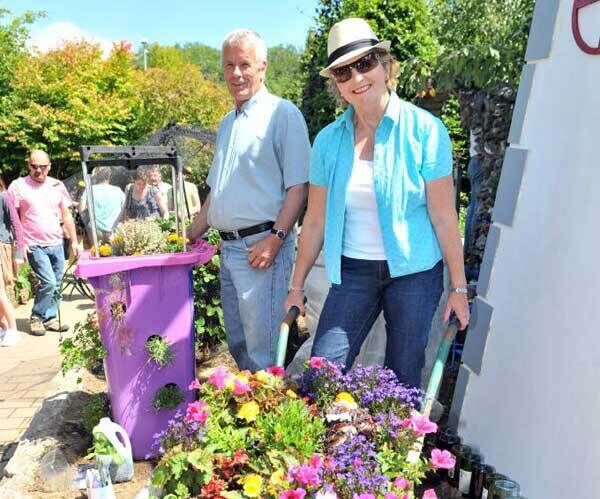 Charlie Sewell and Zwena McCullough from the Hydro Farm, Blarney at the home and garden festival at the Cork Racecourse, Mallow, Co Cork.