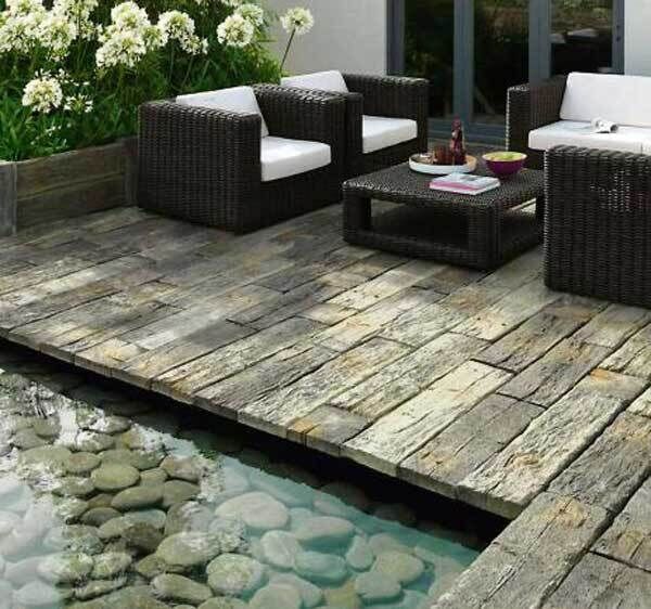 How clever are these concrete slabs? No maintenance, non-slip and practically eternal. Timber sleeper effect patio made from concrete, www.stonemarket.co.uk