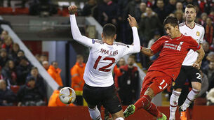 Timid Manchester United pay the price as Liverpool take command