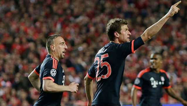 Arturo Vidal and Thomas Muller seal Bayern Munich's progress