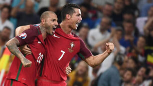 Brave Portugal hold nerve in penalty drama against Poland