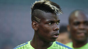 Real boss Zinedine Zidane plays it cool on chase for Paul Pogba