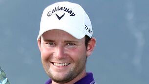 Branden Grace wins and closes on his ‘top 10 goal’