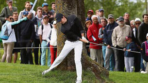 Thongchai Jaidee keeps Rory McIlroy at bay