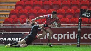 Scrapping Scarlets shock Munster