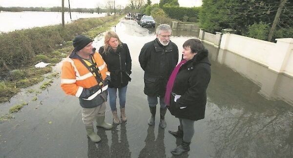 Sinn Féin leader Gerry Adams chats to Joe Quinlivan from Springfield, Clonlara; local Sinn Féin election candidate Noeleen Moran; and Gerardine Quinlivan yesterday. Picture: Brian Gavin Press 22 Sinn Féin leader Gerry Adams chats to Joe Quinlivan from Springfield, Clonlara; local Sinn Féin election candidate Noeleen Moran; and Gerardine Quinlivan yesterday. Picture: Brian Gavin Press 22