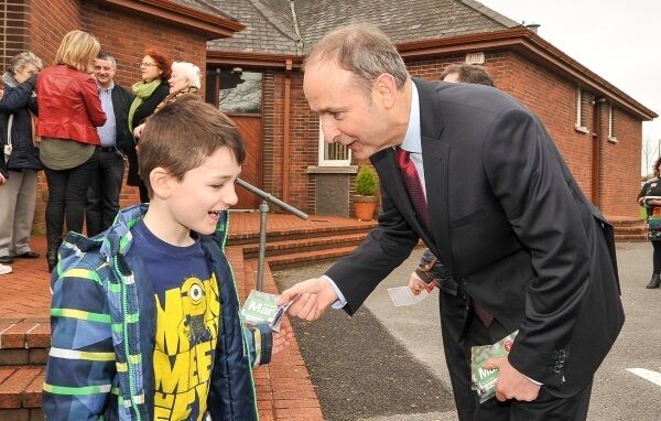 Fianna Fail leader Micheal Martin meets six-year-old Tadhg O’Brien from Douglas
