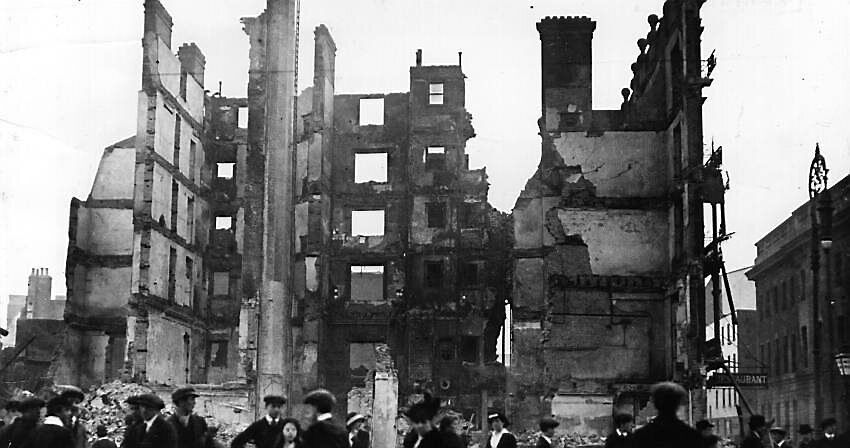 Ruined buildings on Sackville St (now O’Connell St) after the 1916 Easter Rising. Picture: Topical Press Agency/Getty Ruined buildings on Sackville St (now O’Connell St) after the 1916 Easter Rising. Picture: Topical Press Agency/Getty
