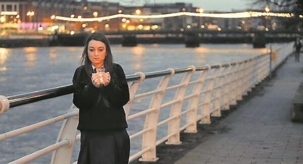 Katie Whelan last May stood with hundreds of others on Thomond Bridge to highlight suicide awareness. Picture: Don Moloney