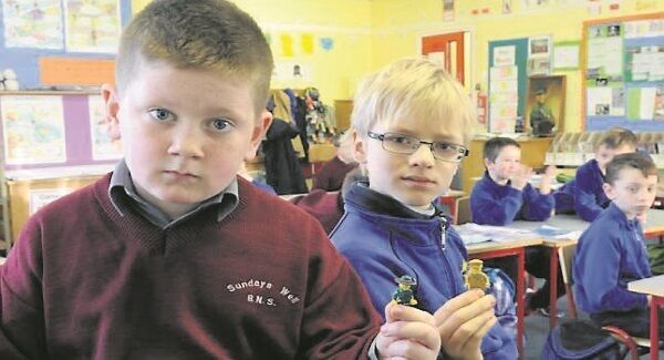 Teacher Michael O’Connor with his third-class students after they recreated the 1916 Rising using Lego and put it on YouTube. Picture: Des Barry