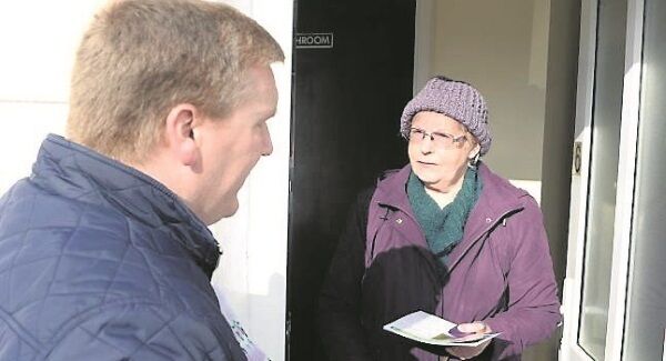 Michael McGrath meets Anne Moore while canvassing in Mount Rivers, Carrigaline, Co Cork. Picture: Denis Scannell