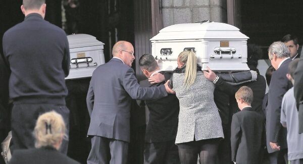 Coffins are carried into the Church of The Most Holy Redeemer in Bray, Co Wicklow, at the joint funeral of Tara Gilbert and her children, Jodie, 9, and Kelsey, 4, and Tara’s partner Willy Lynch and his brother Jimmy, who are brothers of the late Sylvia, brothers-in-law of the late Thomas and uncles of the late Christopher, Jim, and baby Mary Connors, all who died in a fire on October 10 in Carrickmines