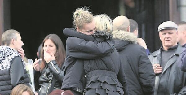 Mourners at the joint funeral of Tara Gilbert and her children Jodie and Kelsey, and Tara’s partner Willy Lynch and his brother Jimmy