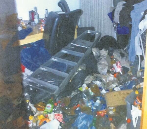 Another shot of the sitting room shows the level of damage done to the apartment.