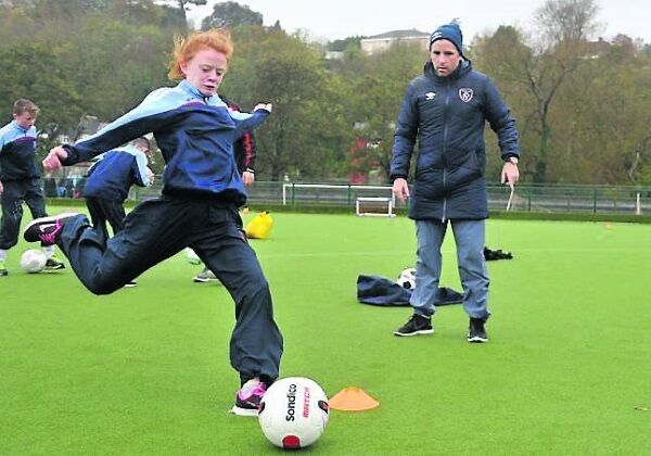 Danielle Hendley goes for power during the event.