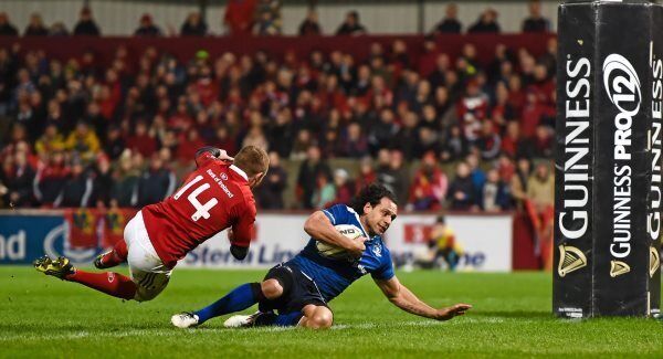 Isa Nacewa goes over to score Leinster’s first try despite the tackle of Keith Earls. Photo: Stephen McCarthy / SPORTSFILE Isa Nacewa goes over to score Leinster’s first try despite the tackle of Keith Earls. Photo: Stephen McCarthy / SPORTSFILE