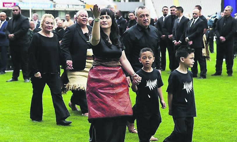 Nadene Lomu, centre, widow of Jonah Lomu, thanks the crowd with her two sons, Brayley, right, and Dhyreille, second right, her mother Lois Kuiek, left, her father, Mervyn Kuiek, top right, and Jonah Lomu’s mother Hepi Lomu, second left.Picture: AP Nadene Lomu, centre, widow of Jonah Lomu, thanks the crowd with her two sons, Brayley, right, and Dhyreille, second right, her mother Lois Kuiek, left, her father, Mervyn Kuiek, top right, and Jonah Lomu’s mother Hepi Lomu, second left.Picture: AP