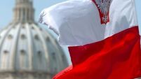 Poland’s president signs disputed media law