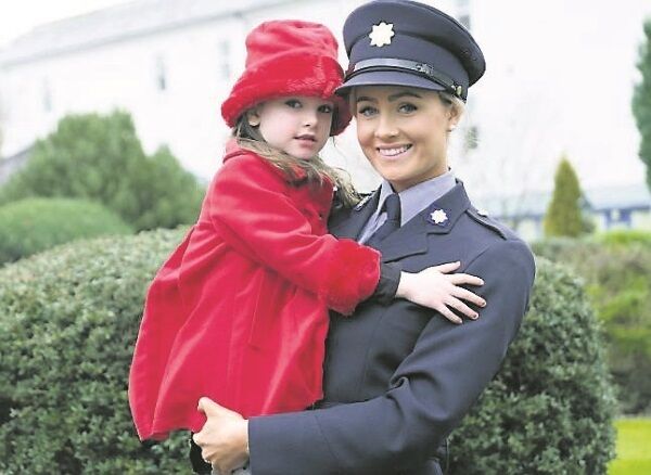 Garda Aoife O’Sullivan from Rathmore, Co Kerry, with her niece, Kelly Moynihan, at the Templemore graduation. Pic: Don Moloney
