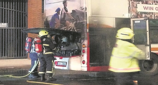 20 escape bus fire as firm defends handling of incident