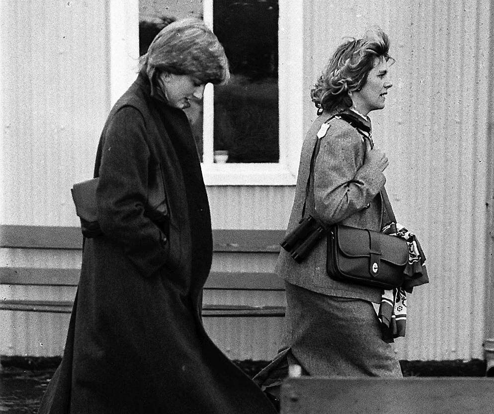 Camilla Parker Bowles (right) and Lady Diana Spencer (later the Princess of Wales) at Ludlow racecourse to watch the Amateur Riders Handicap Steeplechase in which the Prince was competing in 1980