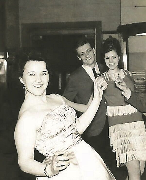 Bride Gallagher dancing the twist with the club’s professional dancers at New York’s Peppermint Club in 1960