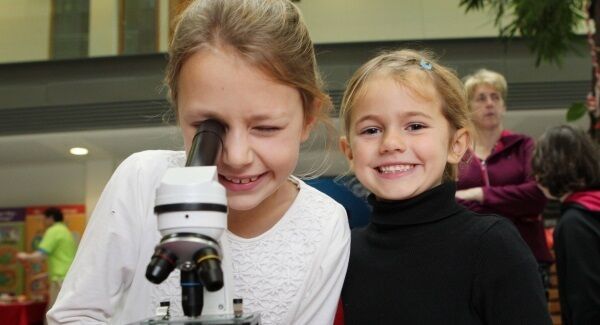 Caitlin and Caoimhe Egan, 7 and 5, from Carrigtwohill, at the recent Cork Science Festival in Western Gateway, UCC. Picture: Diane Cusack