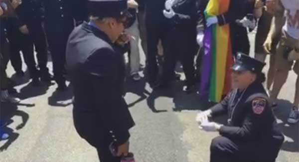 The sweet moment a New York EMT proposes to her girlfriend in the middle of Pride